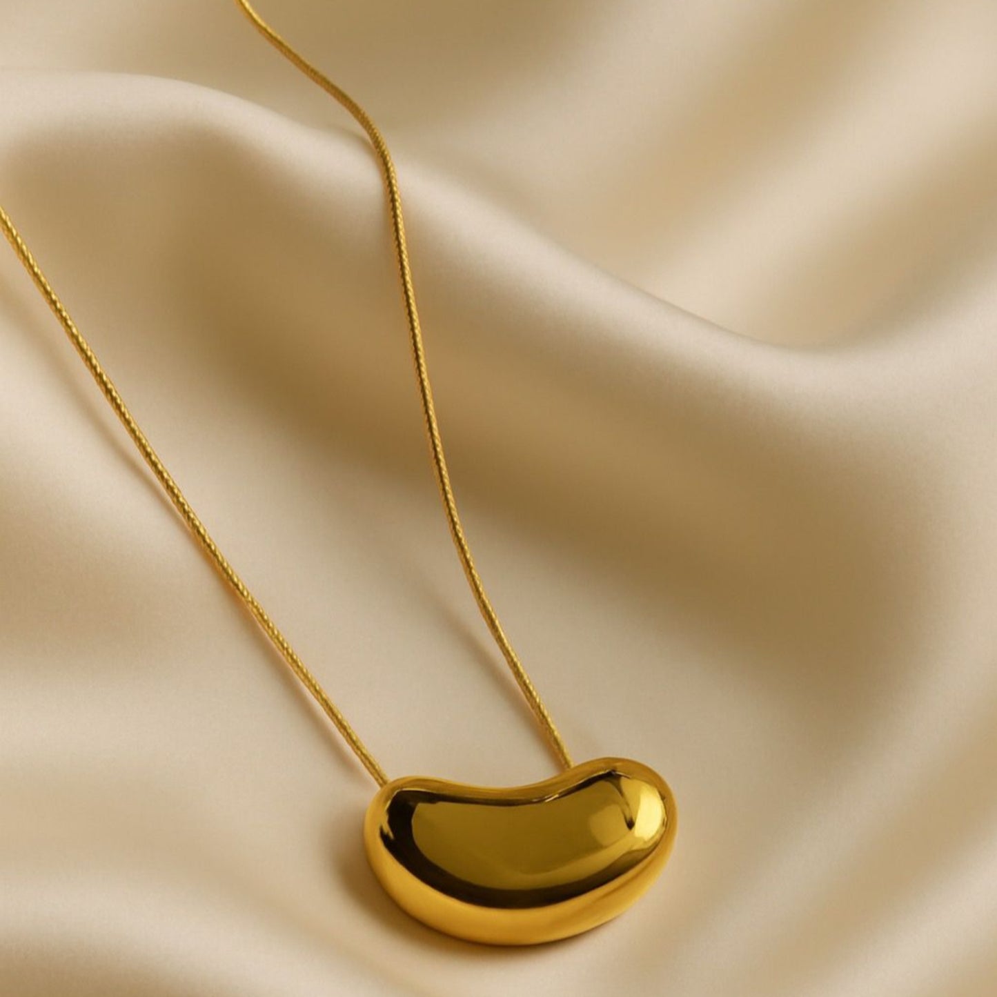 Golden Bean Pendant Necklace